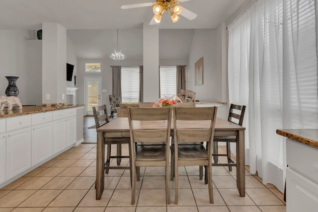 6813 Andress Dr, Fort Worth, TX 76132 - dining room featuring ceiling fan, light tile patterned floors, and vaulted ceiling