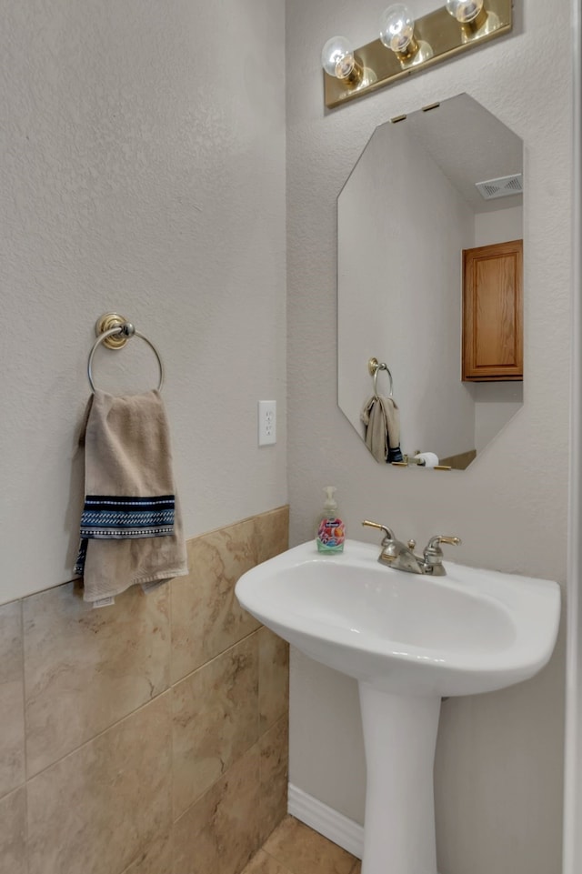 6813 Andress Dr, Fort Worth, TX 76132 - bathroom featuring a sink and tile patterned floors