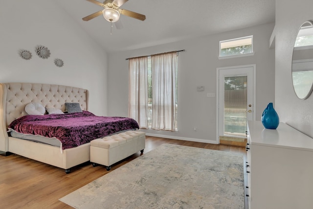6813 Andress Dr, Fort Worth, TX 76132 - bedroom with multiple windows, wood finished floors, vaulted ceiling, a ceiling fan, and baseboards