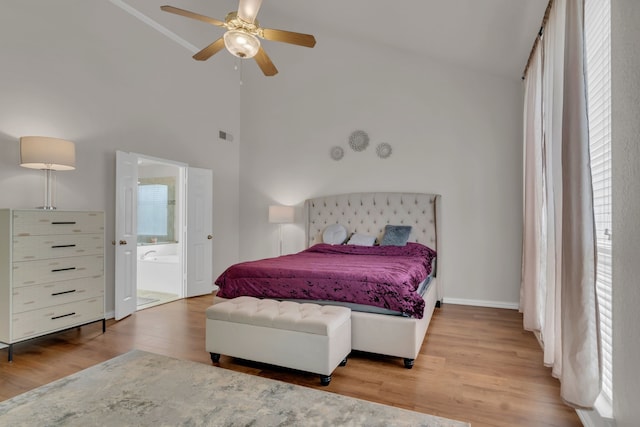 6813 Andress Dr, Fort Worth, TX 76132 - bedroom featuring wood finished floors, lofted ceiling, ensuite bathroom, baseboards, and ceiling fan