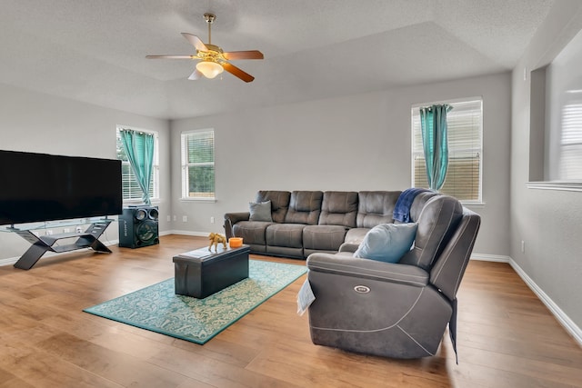6813 Andress Dr, Fort Worth, TX 76132 - living room with wood finished floors, ceiling fan, a textured ceiling, and baseboards