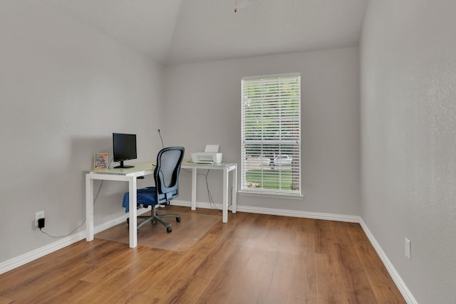 6813 Andress Dr, Fort Worth, TX 76132 - home office featuring wood finished floors, baseboards, and lofted ceiling