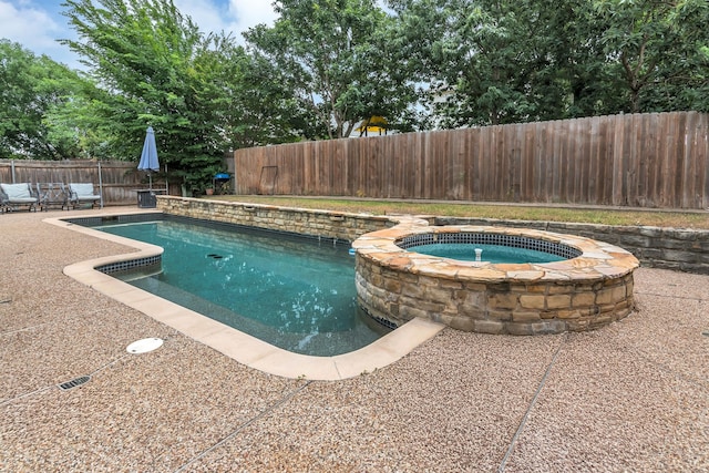 6813 Andress Dr, Fort Worth, TX 76132 - view of swimming pool featuring a fenced backyard, a pool with connected hot tub, and a patio
