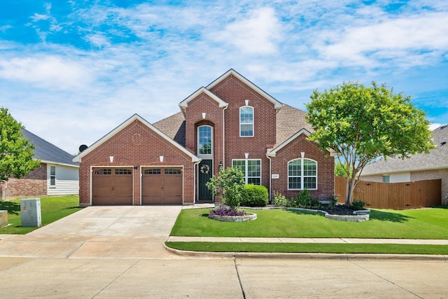 5136 Raisintree Dr, Fort Worth, TX 76244 - traditional-style house with brick siding, an attached garage, and driveway