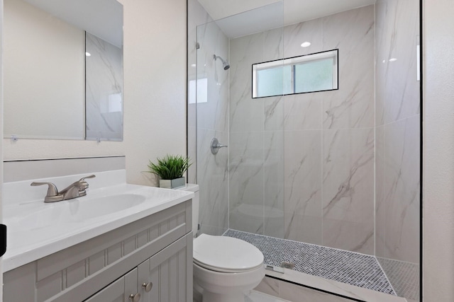 1006 Irene Dr, Mesquite, TX 75149 - bathroom featuring toilet, a marble finish shower, and vanity