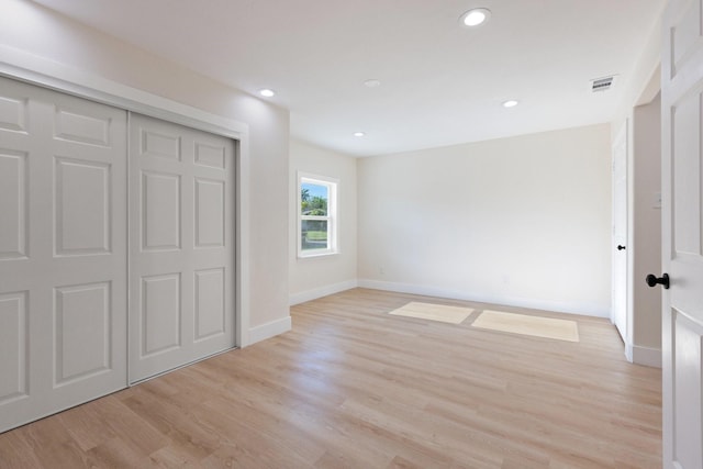 1006 Irene Dr, Mesquite, TX 75149 - unfurnished bedroom featuring baseboards, light wood finished floors, recessed lighting, and a closet