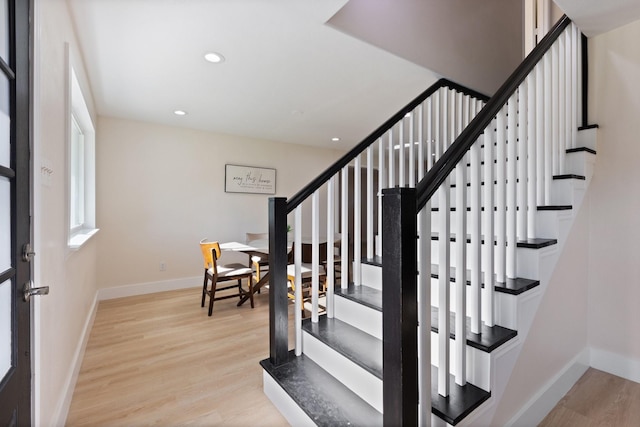 1006 Irene Dr, Mesquite, TX 75149 - entrance foyer with stairs, wood finished floors, baseboards, and recessed lighting