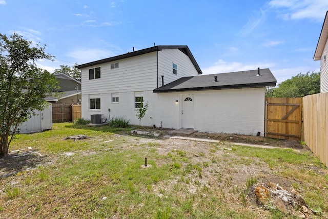 1006 Irene Dr, Mesquite, TX 75149 - rear view of property featuring central AC and brick siding