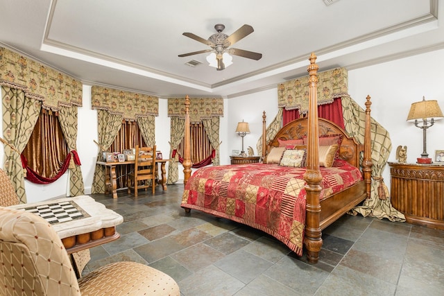 2605 Cherry Sage Dr, Flower Mound, TX 75022 - bedroom featuring a tray ceiling, stone tile flooring, ornamental molding, and ceiling fan