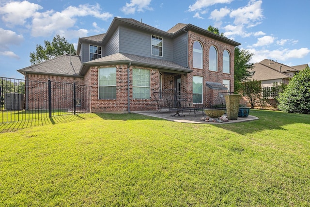 2605 Cherry Sage Dr, Flower Mound, TX 75022 - rear view of house with a patio area, brick siding, and roof with shingles