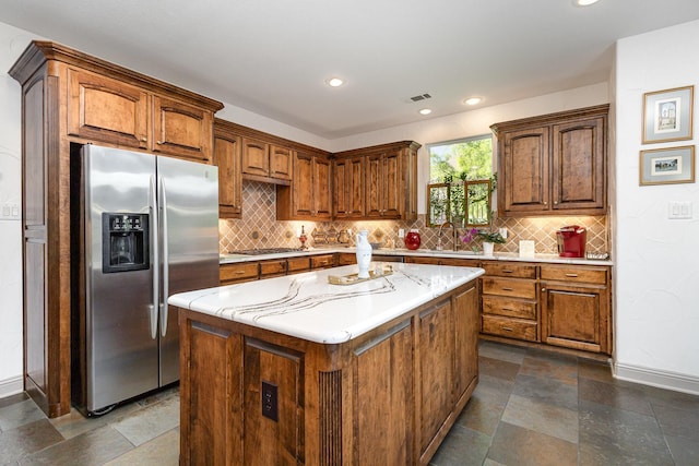 2605 Cherry Sage Dr, Flower Mound, TX 75022 - kitchen featuring stainless steel appliances, backsplash, baseboards, a sink, and recessed lighting