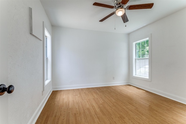 3109 S Wesleyan Dr, Fort Worth, TX 76105 - unfurnished room featuring light wood-type flooring, baseboards, and a ceiling fan