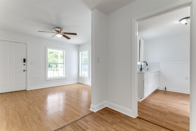3109 S Wesleyan Dr, Fort Worth, TX 76105 - entryway with ceiling fan, light wood-type flooring, and baseboards