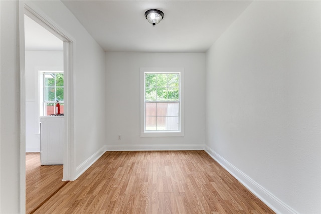 3109 S Wesleyan Dr, Fort Worth, TX 76105 - unfurnished room with light wood finished floors, healthy amount of natural light, and baseboards