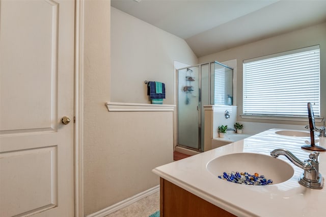 223 Troy Ln, Red Oak, TX 75154 - bathroom featuring a stall shower, lofted ceiling, double vanity, tile patterned floors, and baseboards
