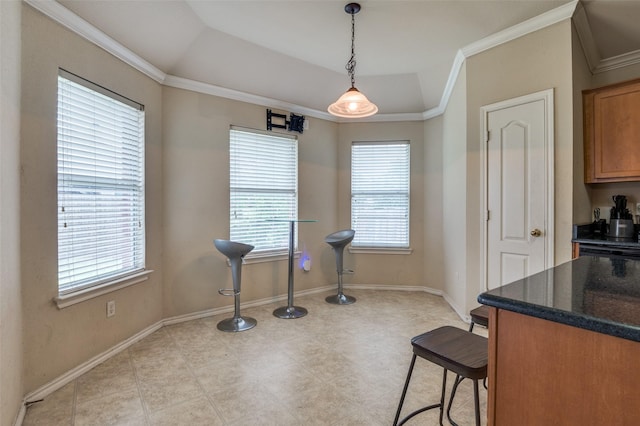 223 Troy Ln, Red Oak, TX 75154 - dining area with crown molding, healthy amount of natural light, and baseboards