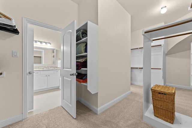 7048 Fullerton Cir, Frisco, TX 75035 - walk in closet featuring light carpet