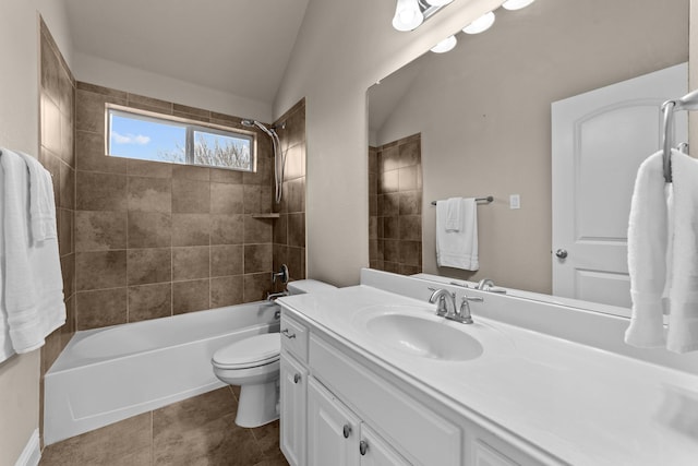 7048 Fullerton Cir, Frisco, TX 75035 - bathroom with toilet, vanity, lofted ceiling, tub / shower combination, and tile patterned floors