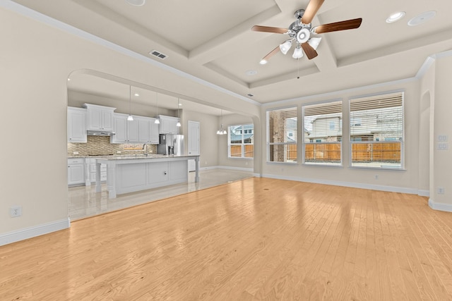 7048 Fullerton Cir, Frisco, TX 75035 - unfurnished living room with ceiling fan, coffered ceiling, recessed lighting, light wood-style flooring, and baseboards