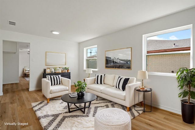 12816/12818 Pandora Dr, Dallas, TX 75238 - living room featuring wood finished floors and baseboards