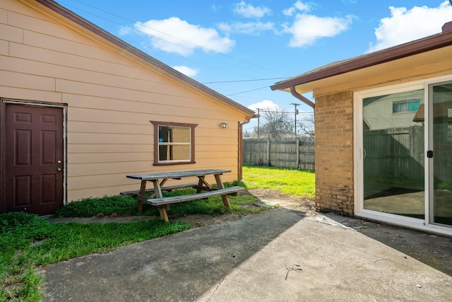 12816/12818 Pandora Dr, Dallas, TX 75238 - view of patio / terrace featuring fence