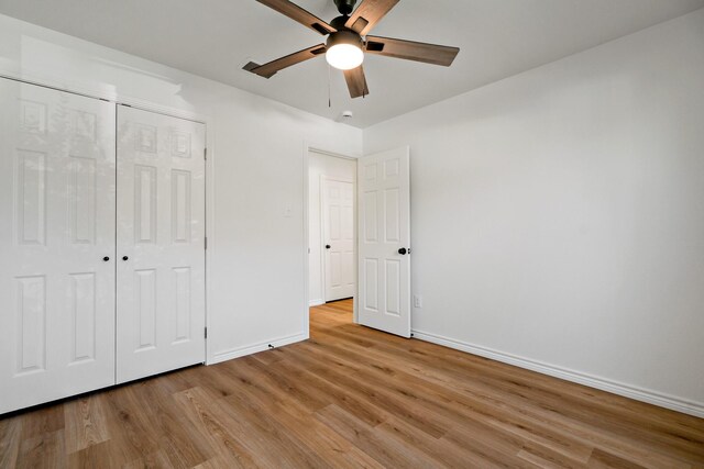 12816/12818 Pandora Dr, Dallas, TX 75238 - unfurnished bedroom with baseboards, light wood finished floors, a closet, and a ceiling fan
