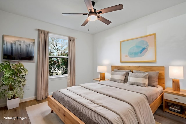 12816/12818 Pandora Dr, Dallas, TX 75238 - bedroom featuring wood finished floors, baseboards, and a ceiling fan