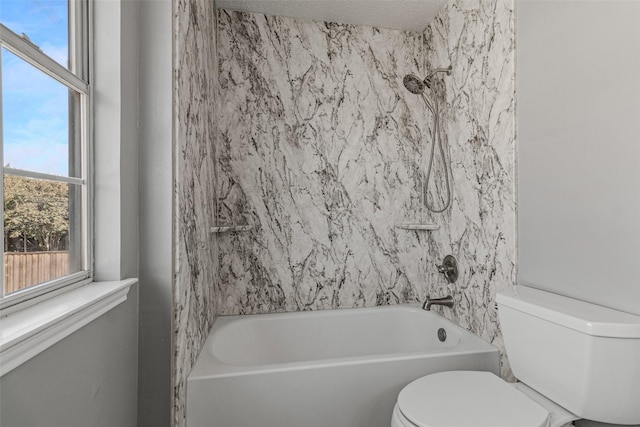 7129 Don Gomez Ln, Garland, TX 75043 - full bathroom featuring toilet,  shower combination, and a textured ceiling