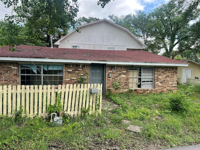 606 W Newton St Unit A, Terrell, TX 75160 - view of front of property featuring fence and brick siding