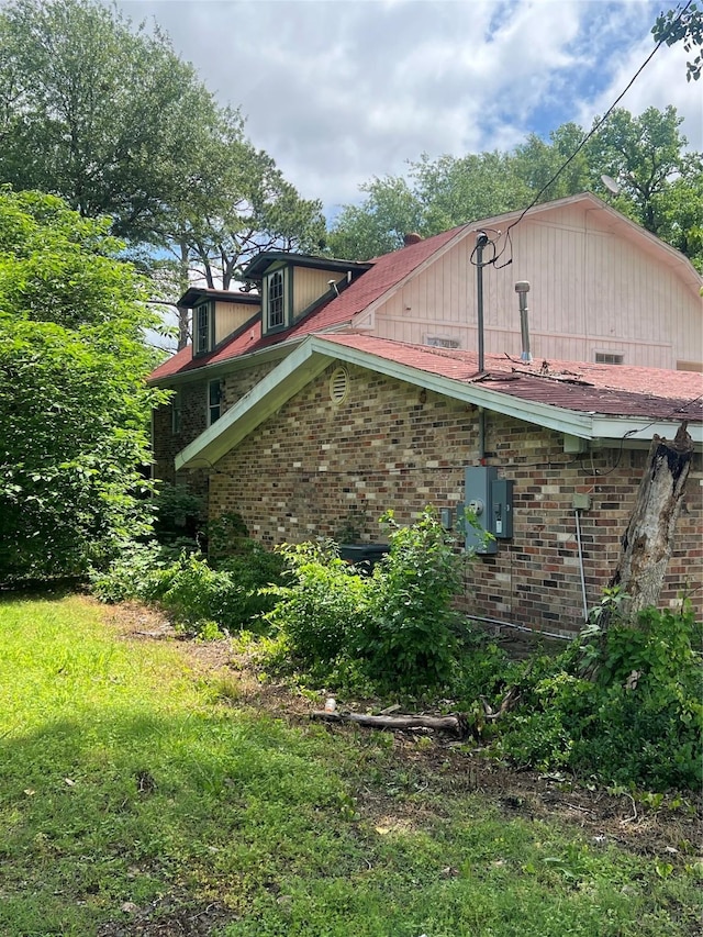 606 W Newton St Unit A, Terrell, TX 75160 - view of side of property with brick siding