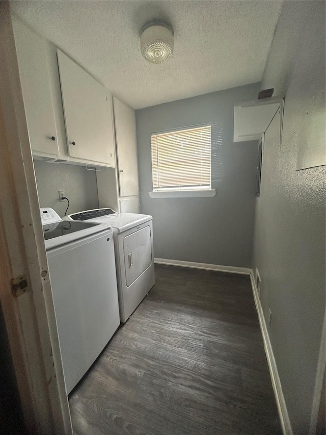1024 W Chestnut St, Denison, TX 75020 - laundry room with washing machine and clothes dryer, cabinet space, wood finished floors, a textured ceiling, and baseboards