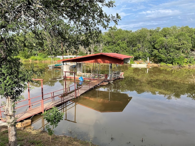 1026 County Road 1744, Chico, TX 76431 - dock featuring a water view and boat lift