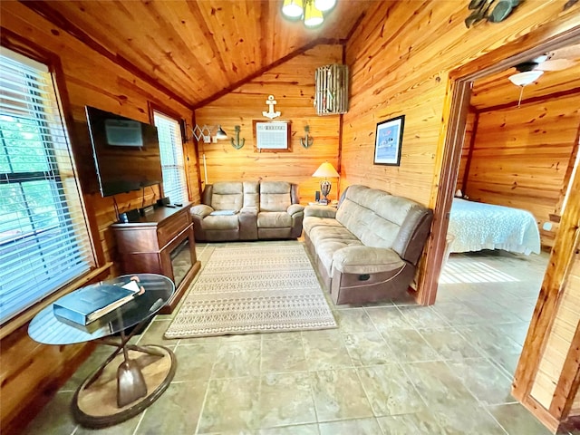 1026 County Road 1744, Chico, TX 76431 - living room with wood walls, lofted ceiling, and wood ceiling