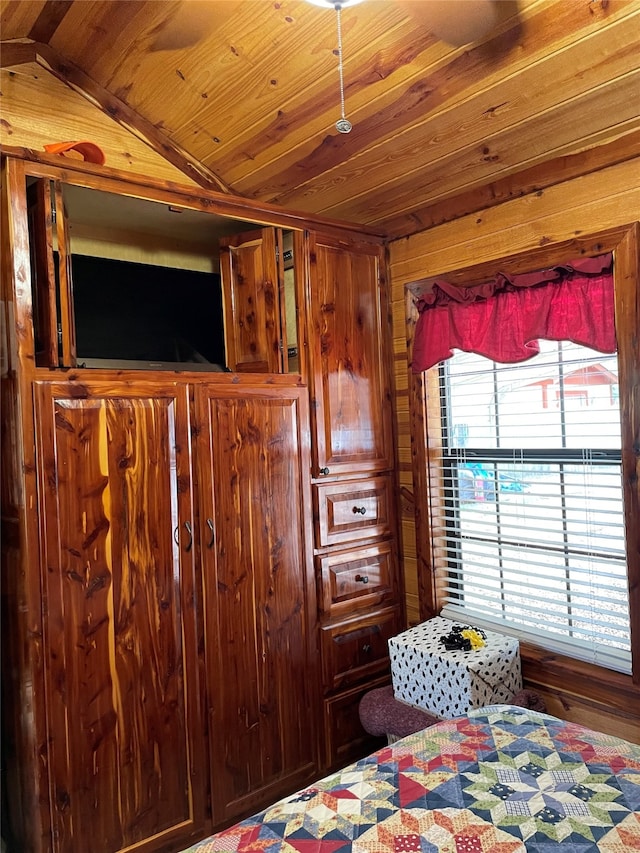1026 County Road 1744, Chico, TX 76431 - bedroom featuring wooden walls, wood ceiling, and vaulted ceiling