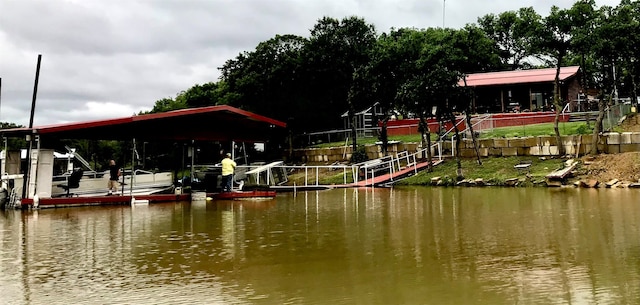 1026 County Road 1744, Chico, TX 76431 - dock area featuring a water view and boat lift