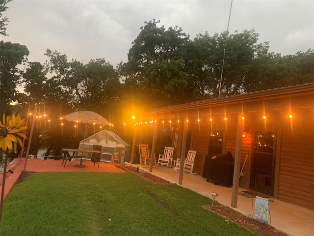1026 County Road 1744, Chico, TX 76431 - view of grassy yard featuring a patio