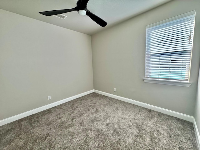 3015 Ruby Dr, Wylie, TX 75098 - spare room featuring carpet flooring, a ceiling fan, and baseboards