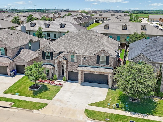 1505 Taylor Ln, Mckinney, TX 75071 - view of front facade featuring a residential view, driveway, and an attached garage
