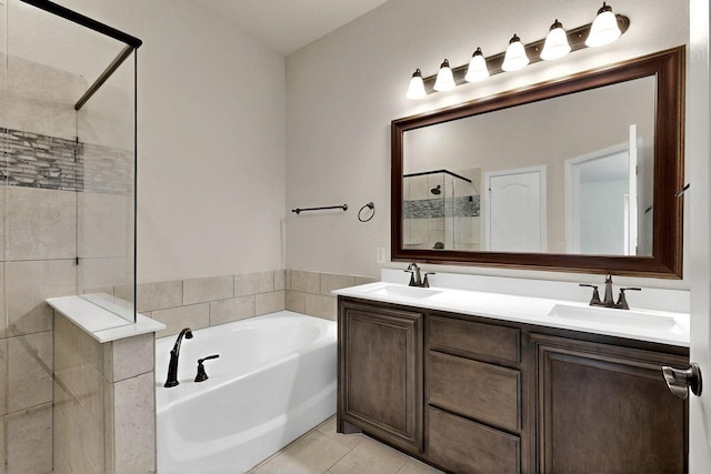 3817 Myrtle Way, Kaufman, TX 75142 - bathroom with a stall shower, a garden tub, double vanity, and tile patterned floors