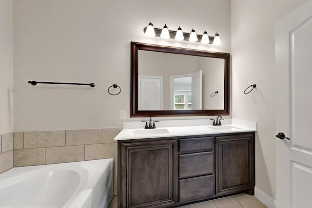 3817 Myrtle Way, Kaufman, TX 75142 - bathroom featuring double vanity, a garden tub, and tile patterned flooring