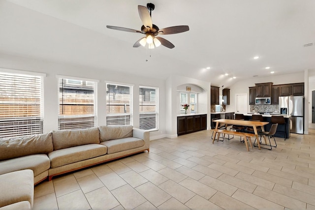 3817 Myrtle Way, Kaufman, TX 75142 - living area featuring a ceiling fan, recessed lighting, vaulted ceiling, baseboards, and light tile patterned floors