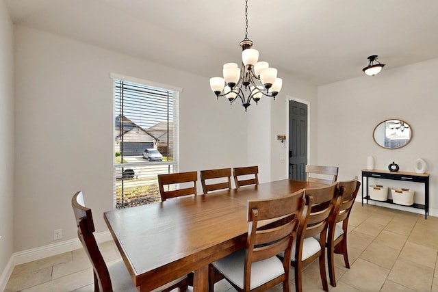 3817 Myrtle Way, Kaufman, TX 75142 - dining space with a chandelier, light tile patterned floors, and baseboards