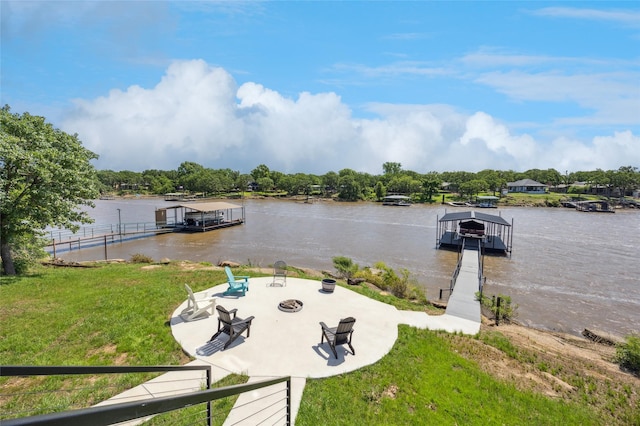 563 Country Club Rd, Bowie, TX 76230 - dock featuring a water view, an outdoor fire pit, a lawn, and a patio area