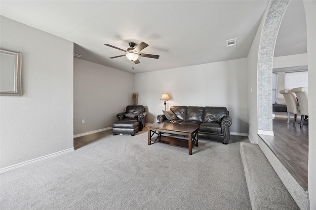 563 Country Club Rd, Bowie, TX 76230 - living room featuring a ceiling fan, baseboards, and carpet floors