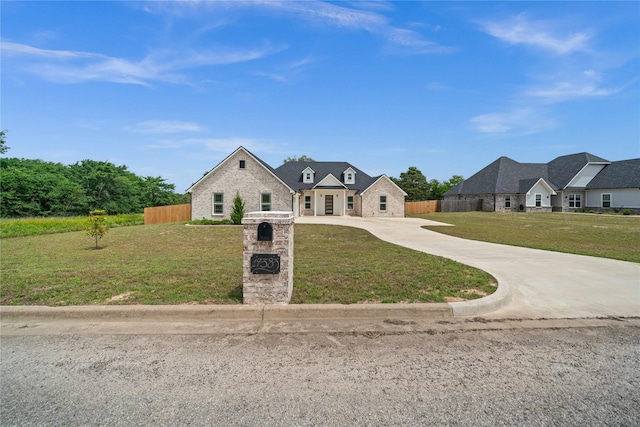 19383 Ridge Pt, Lindale, TX 75771 - view of front facade featuring driveway and stone siding