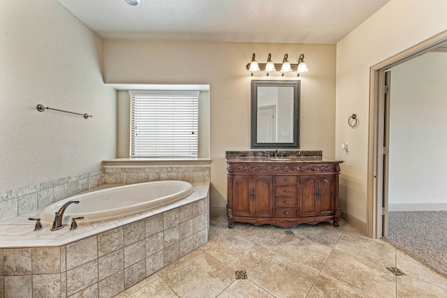 10601 San Simeon Ln, Fort Worth, TX 76179 - full bathroom with vanity, a bath, and tile patterned floors