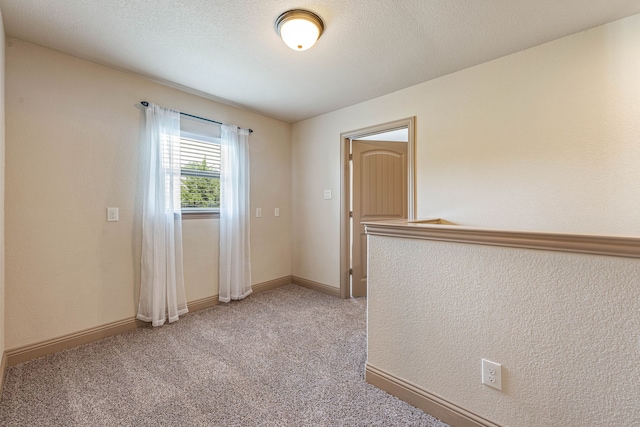 10601 San Simeon Ln, Fort Worth, TX 76179 - unfurnished room featuring light colored carpet and baseboards