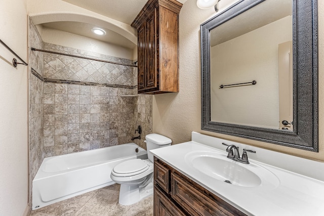 10601 San Simeon Ln, Fort Worth, TX 76179 - full bathroom with vanity, toilet, bathtub / shower combination, and a textured wall