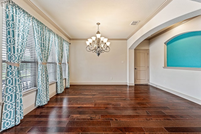 10601 San Simeon Ln, Fort Worth, TX 76179 - unfurnished dining area featuring a chandelier, hardwood / wood-style floors, arched walkways, crown molding, and baseboards
