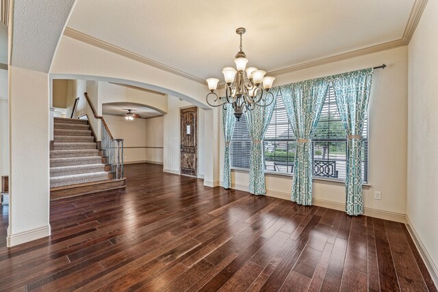 10601 San Simeon Ln, Fort Worth, TX 76179 - unfurnished dining area with arched walkways, a chandelier, stairs, wood finished floors, and ornamental molding